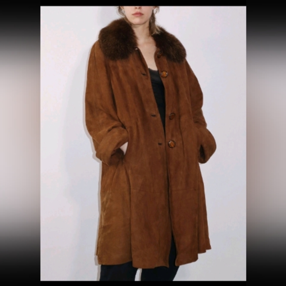 100%  Suede with a removable thick rich mink collar.